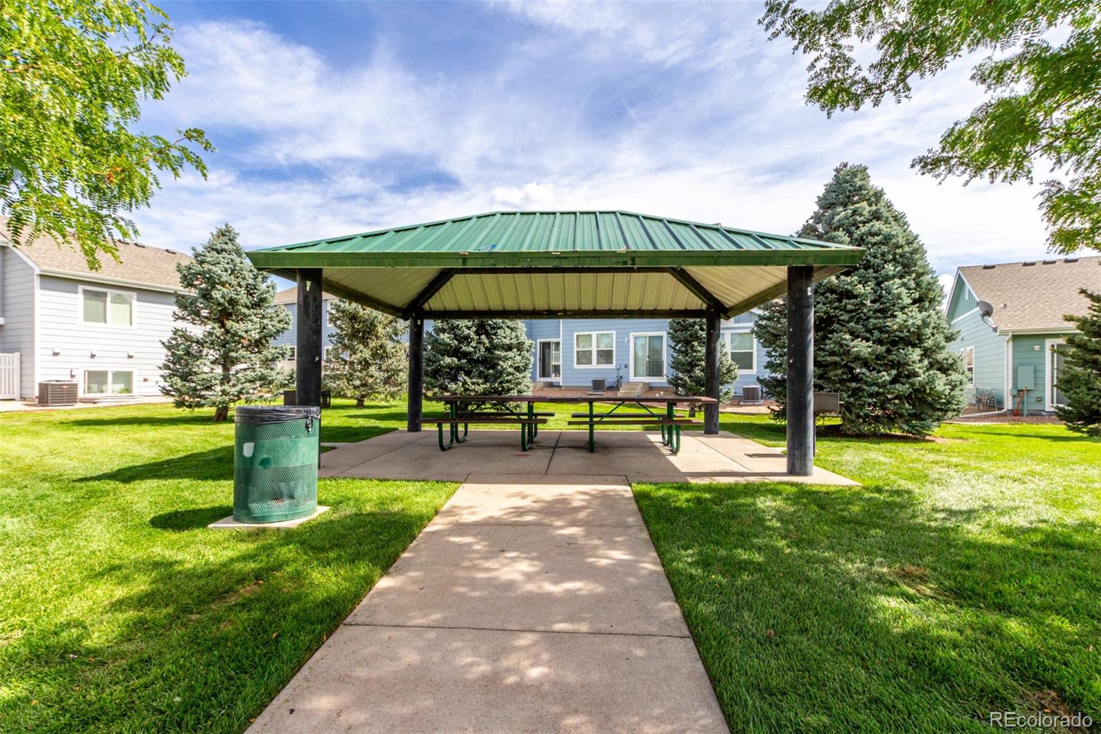 5850 Ceylon Street, Unit D Denver, CO 80249 - Photo 31 of 33 a view of a swimming pool with a patio