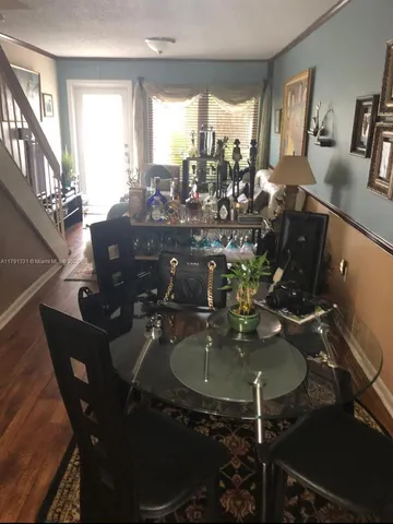 a view of a dining room with furniture