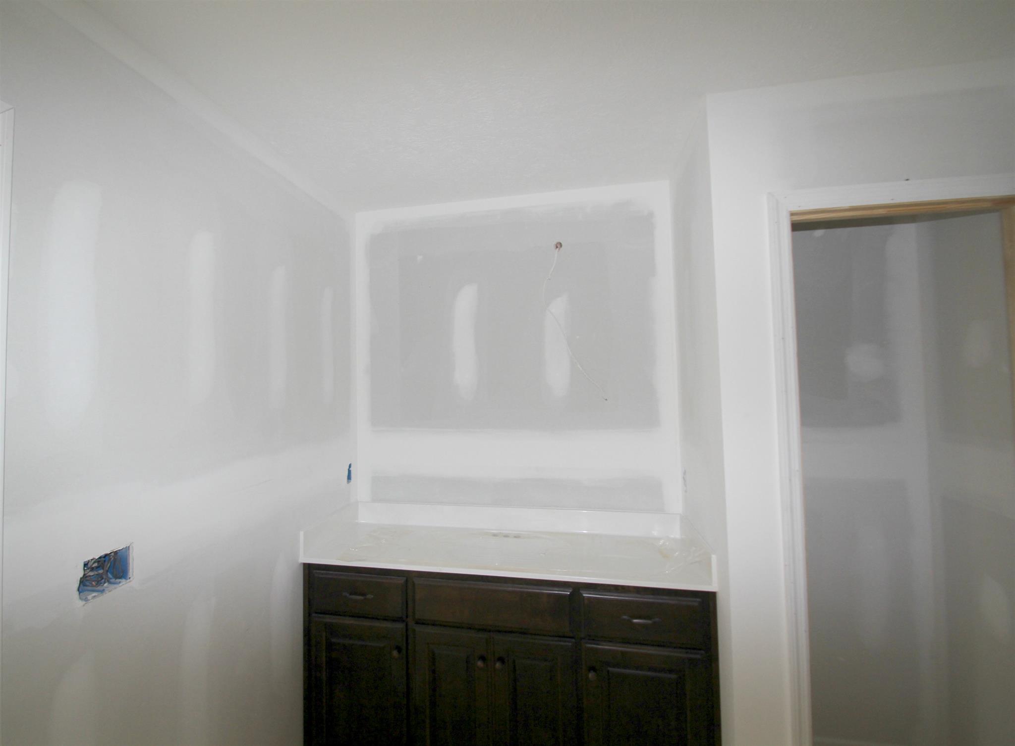 194 Ferrells Loop Road Manchester, TN 37355 - Photo 6 of 10 a bathroom with a sink and vanity
