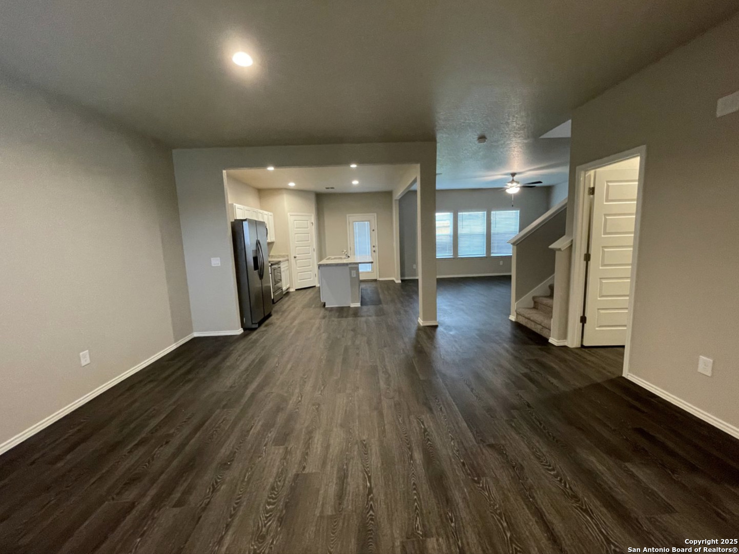 13018 Candace Way St. Hedwig, TX 78152 - Photo 4 of 15 a view of a hallway with wooden floor