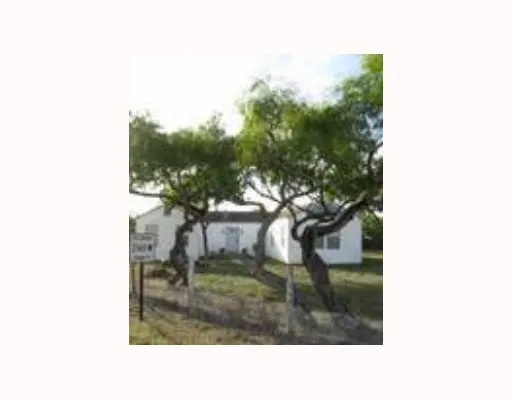 a black and white photo of a house