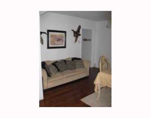 1196 E Creek Riviera, TX 78379 - Photo 2 of 7 a living room with furniture and a potted plant