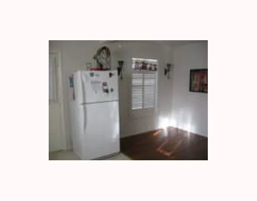 a picture of a bathroom with a sink and mirror