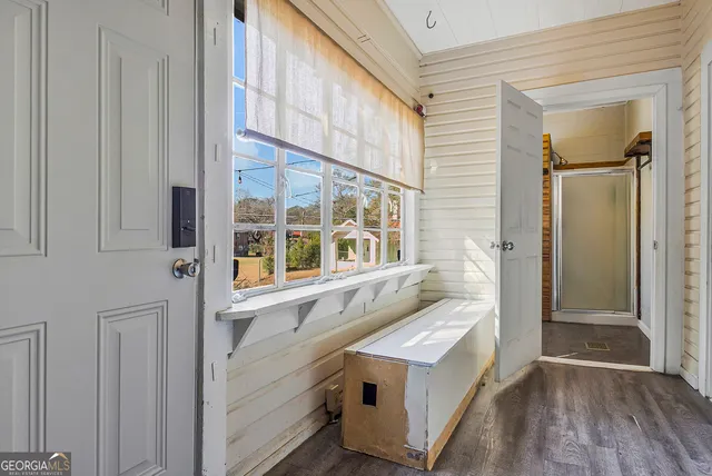 a bathroom with a sink and a large mirror