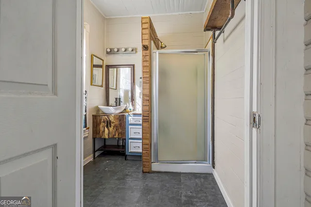 a view of front door and wooden floor
