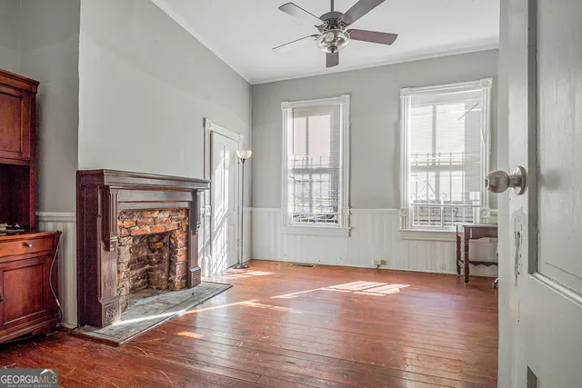 a workspace with furniture and wooden floor