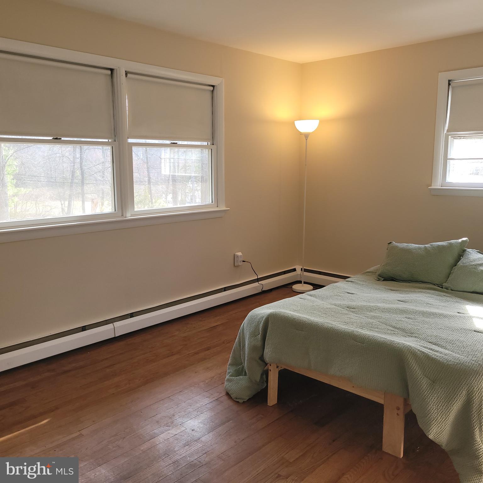 2720 Hauck Road Green Lane, PA 18054 - Photo 11 of 30 a bedroom with a bed and a window