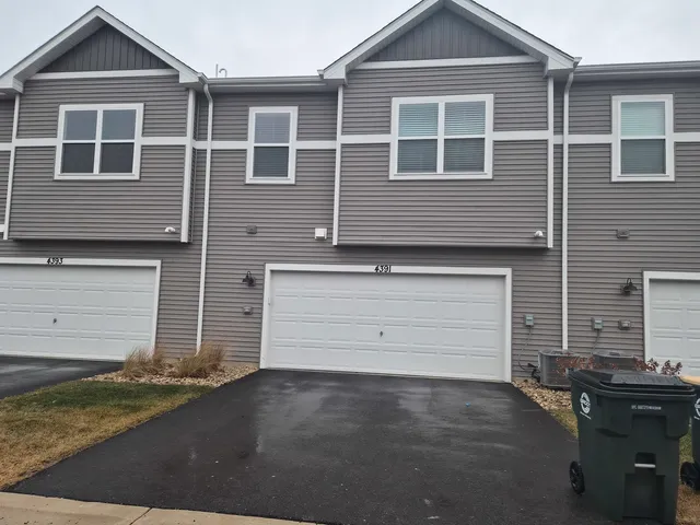 a front view of a building with street view