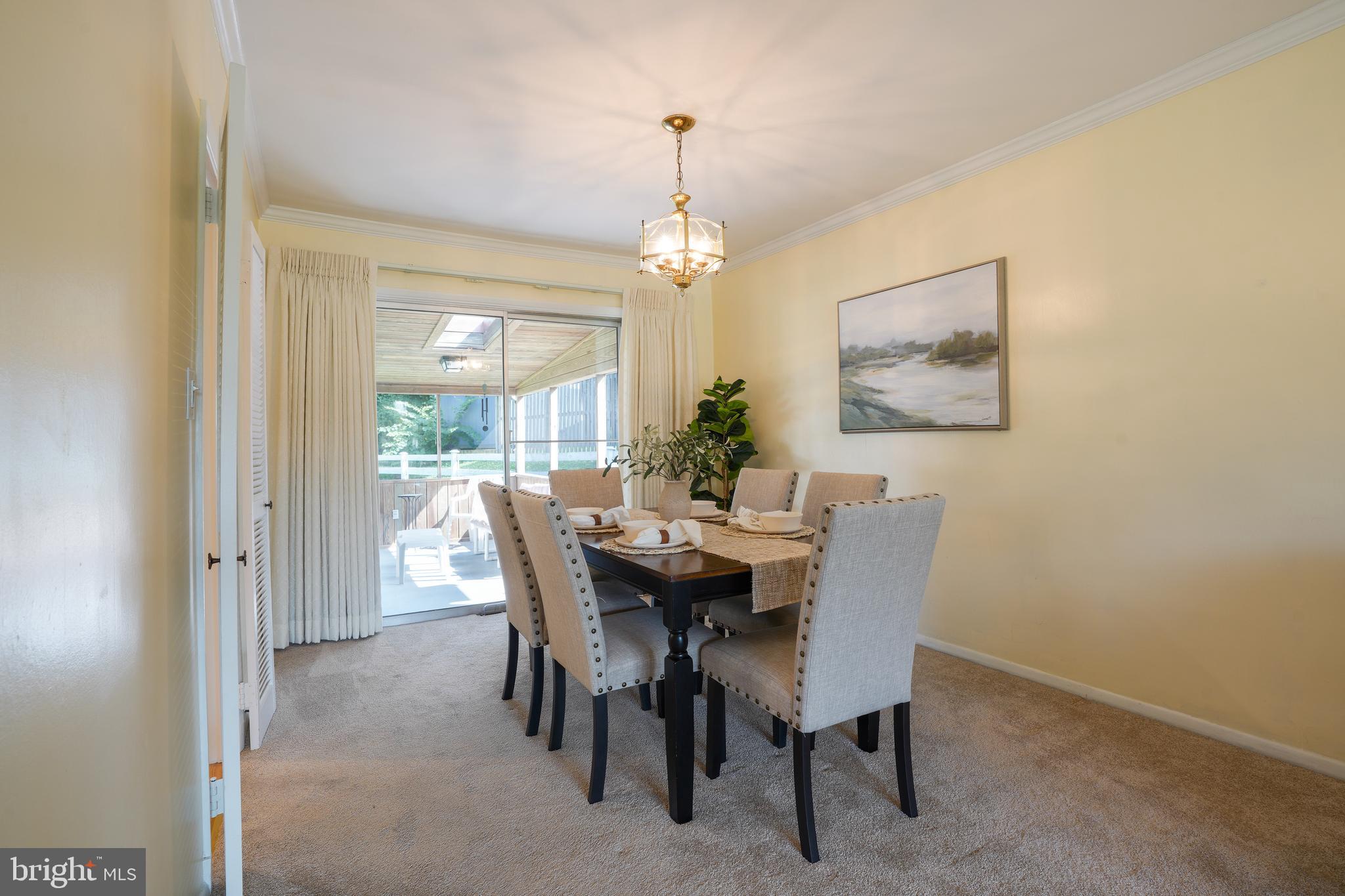 437 Neepier Road Baltimore, MD 21228 - Photo 7 of 29 Dining room w access to large screened porch