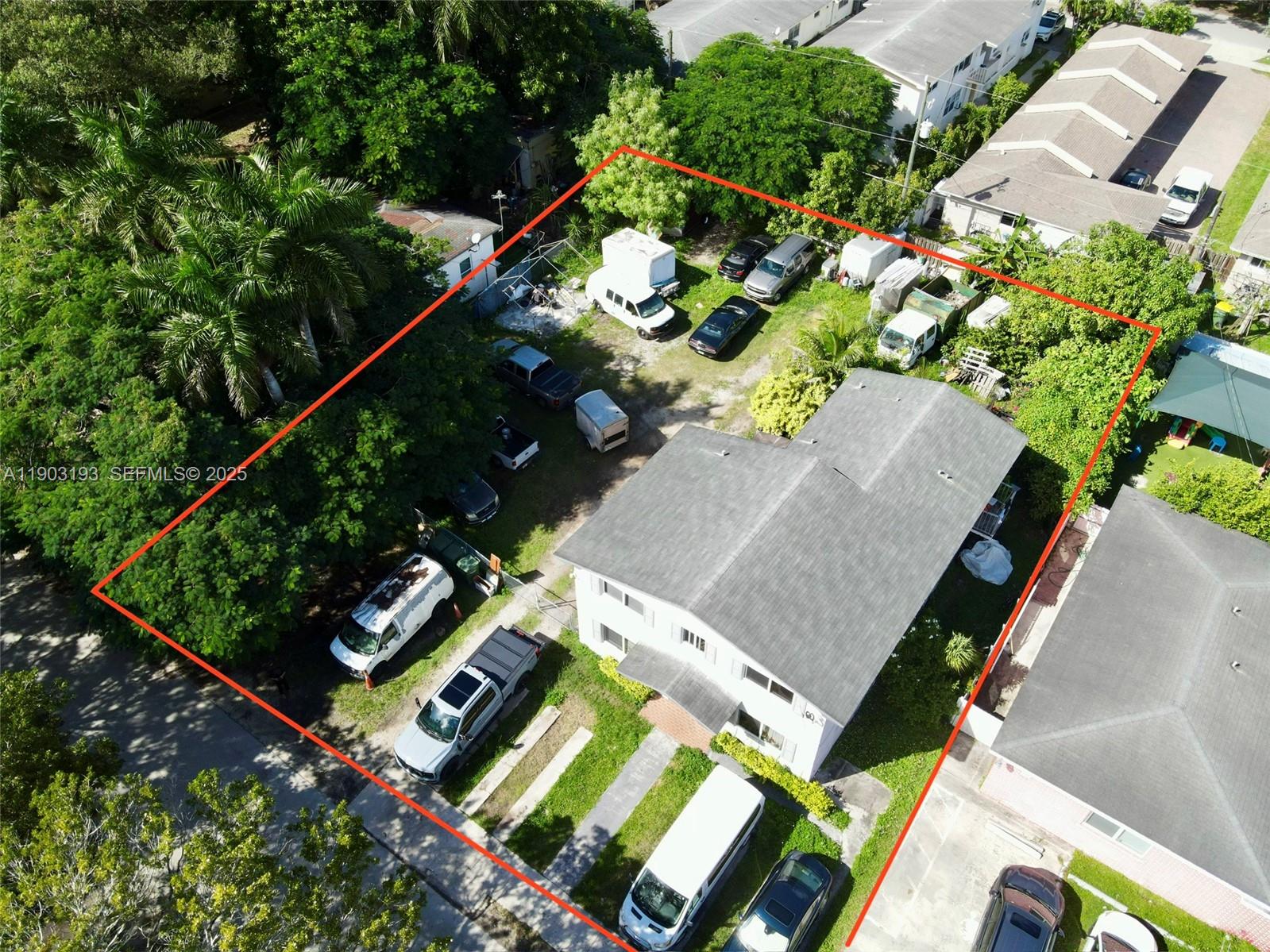 147 Northeast 9th Street Homestead, FL 33030 - Photo 4 of 4 an aerial view of a house roof deck