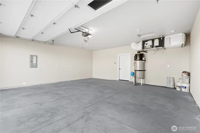 a view of empty room with ceiling fan