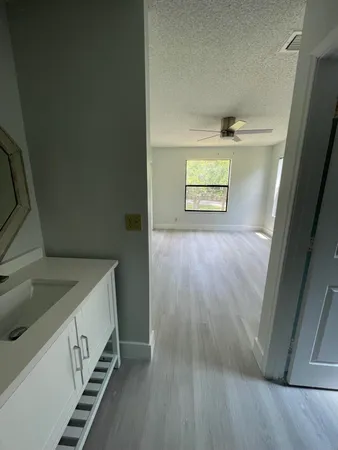 a view of an empty room and window