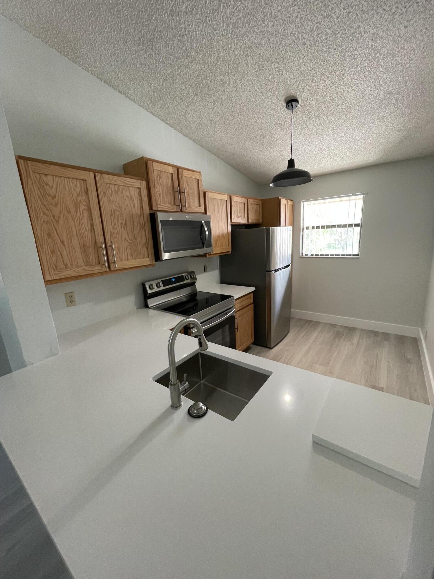 3350 Jaywood Terrace, Unit J221 Boca Raton, FL 33431 - Photo 21 of 31 a view of workspace with a window