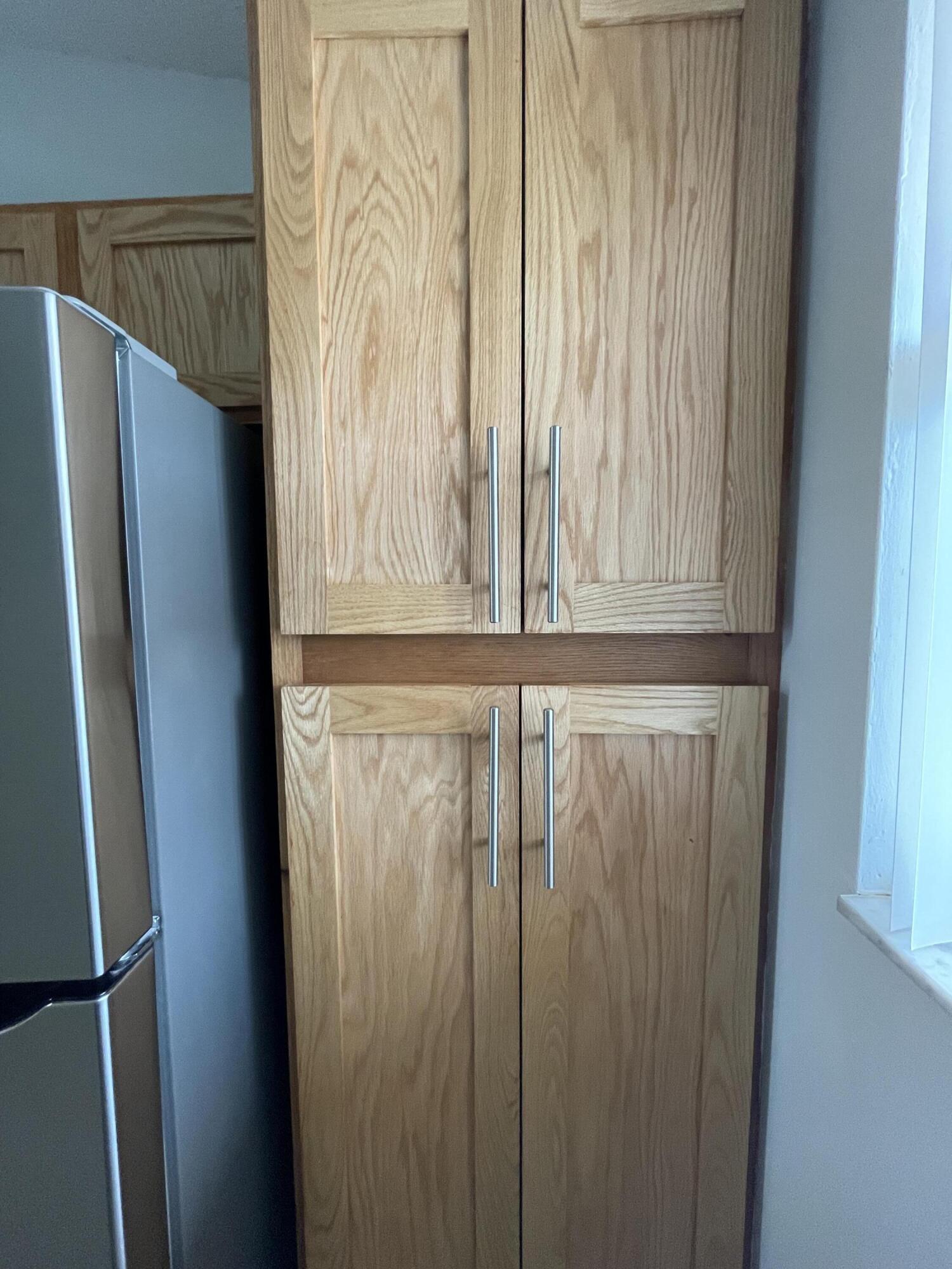 3350 Jaywood Terrace, Unit J221 Boca Raton, FL 33431 - Photo 24 of 31 a close view of wooden door