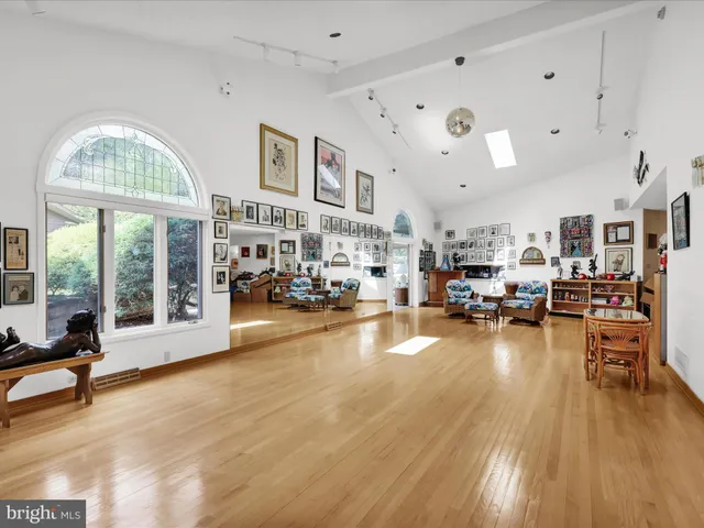 a bedroom with a bed and night stand