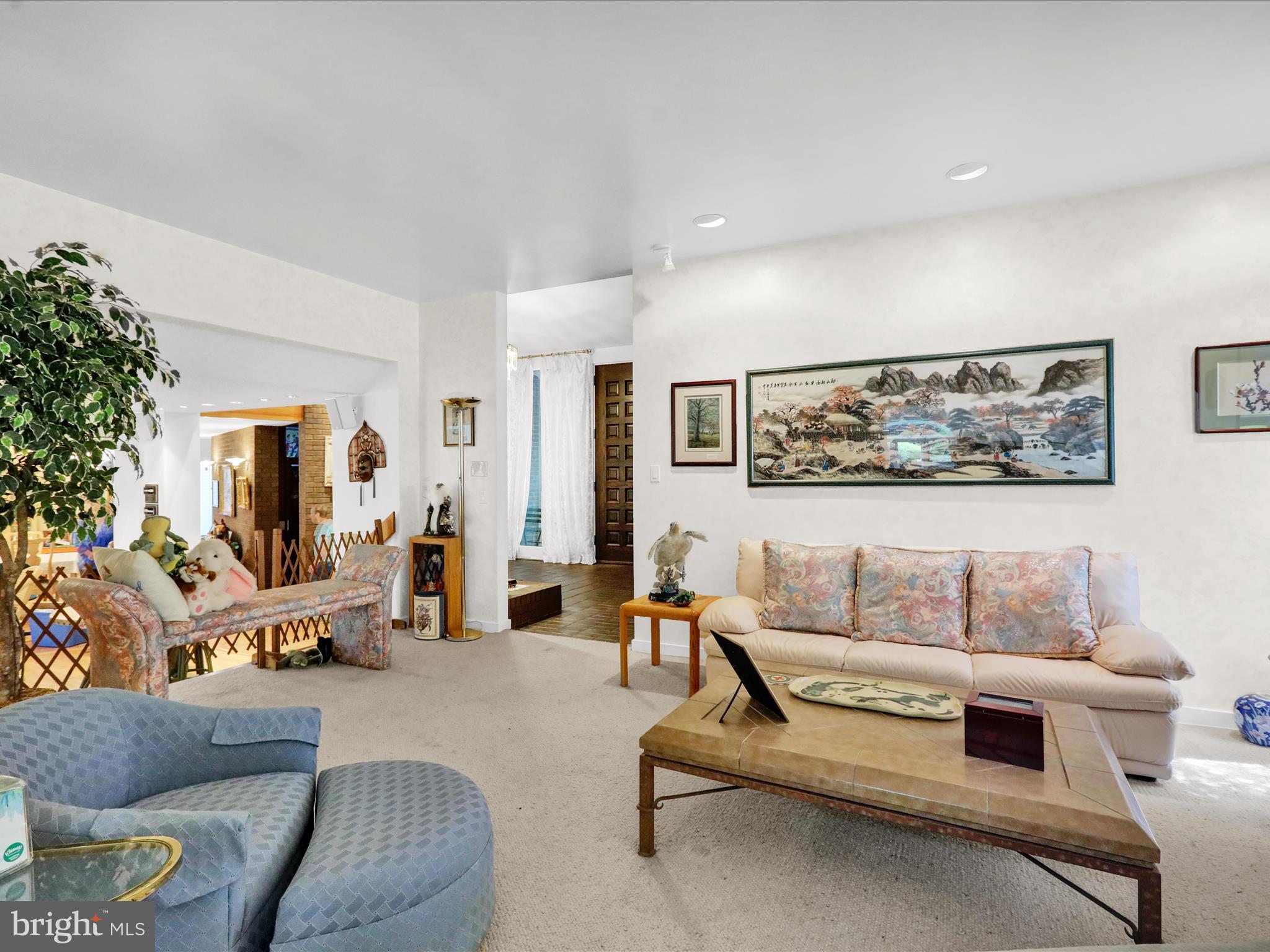 1617 Meadowlark Road Wyomissing, PA 19610 - Photo 17 of 99 a living room with furniture and a painting