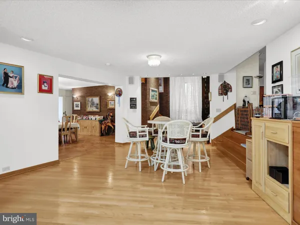 a view of a brick house with wooden floor