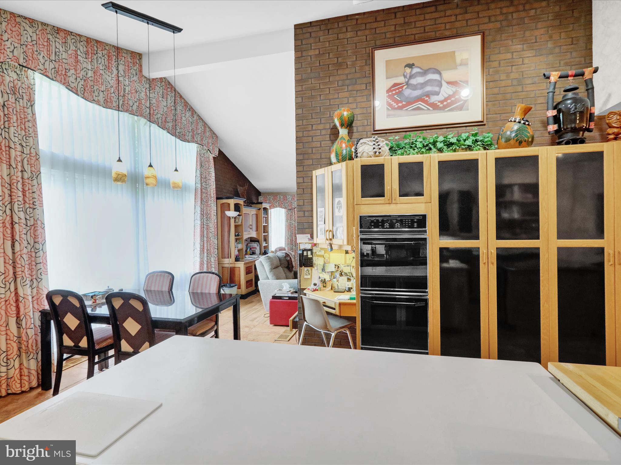 1617 Meadowlark Road Wyomissing, PA 19610 - Photo 24 of 99 a view of a livingroom with furniture and an empty room