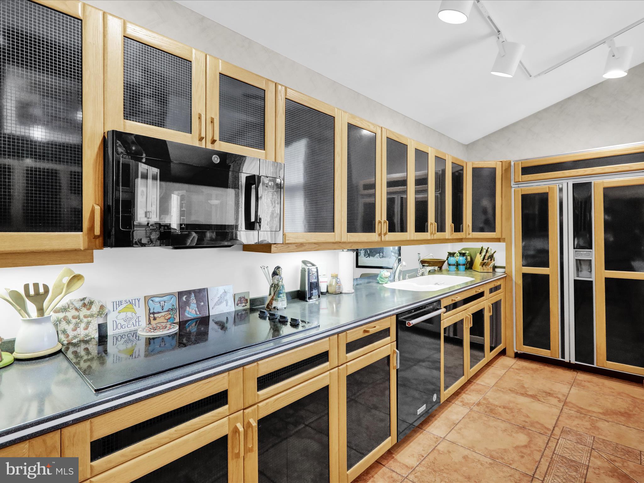 1617 Meadowlark Road Wyomissing, PA 19610 - Photo 29 of 99 a kitchen with stainless steel appliances granite countertop a stove and a sink