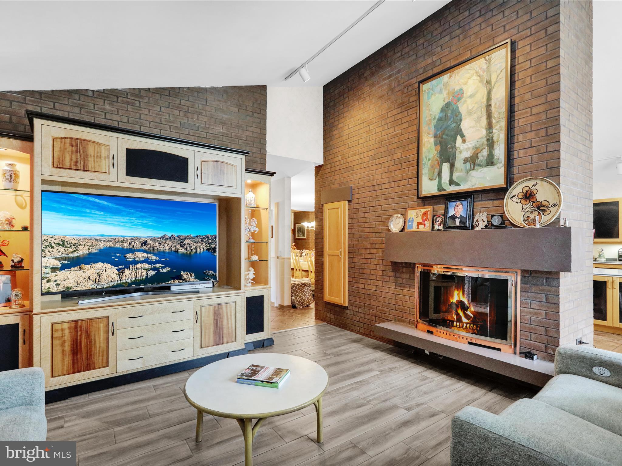 1617 Meadowlark Road Wyomissing, PA 19610 - Photo 31 of 99 a living room with furniture and a fireplace