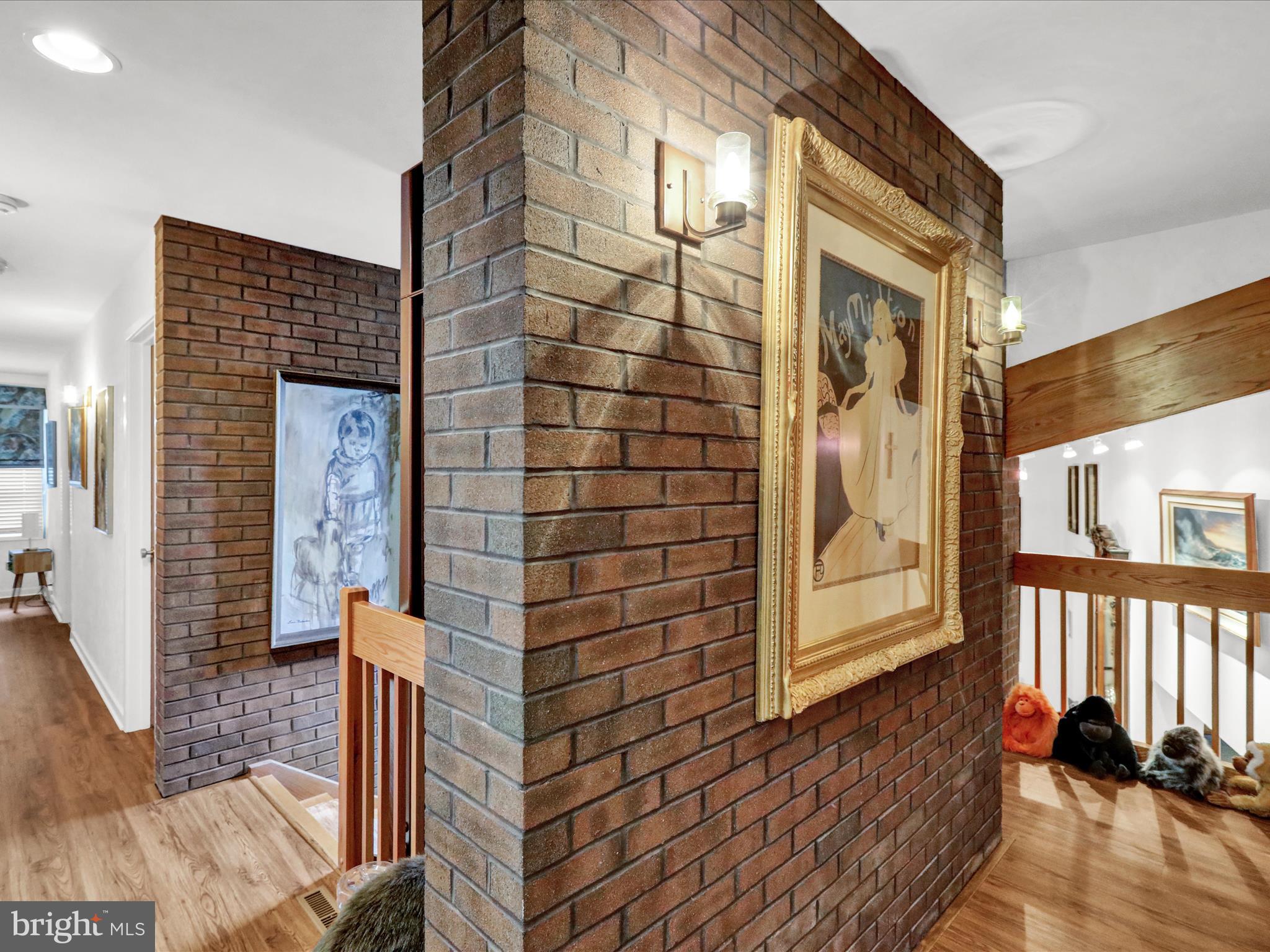 1617 Meadowlark Road Wyomissing, PA 19610 - Photo 34 of 99 a view of a brick house with wooden floor