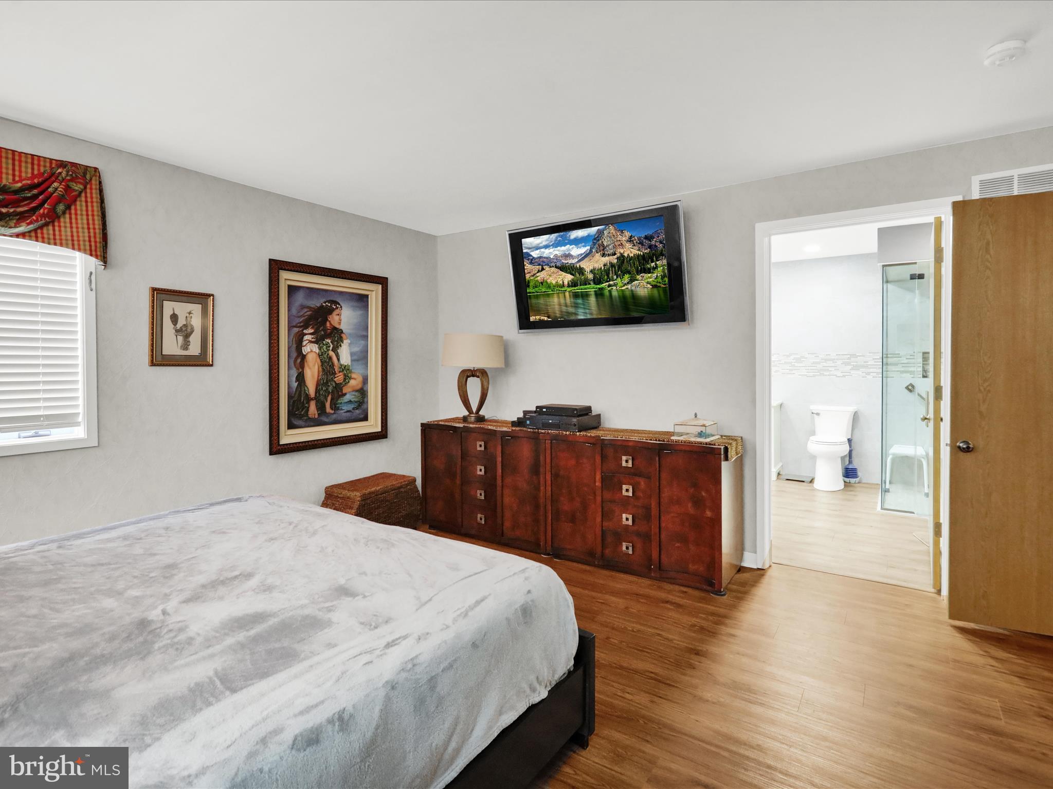 1617 Meadowlark Road Wyomissing, PA 19610 - Photo 38 of 99 a bedroom with a bed and a flat screen tv