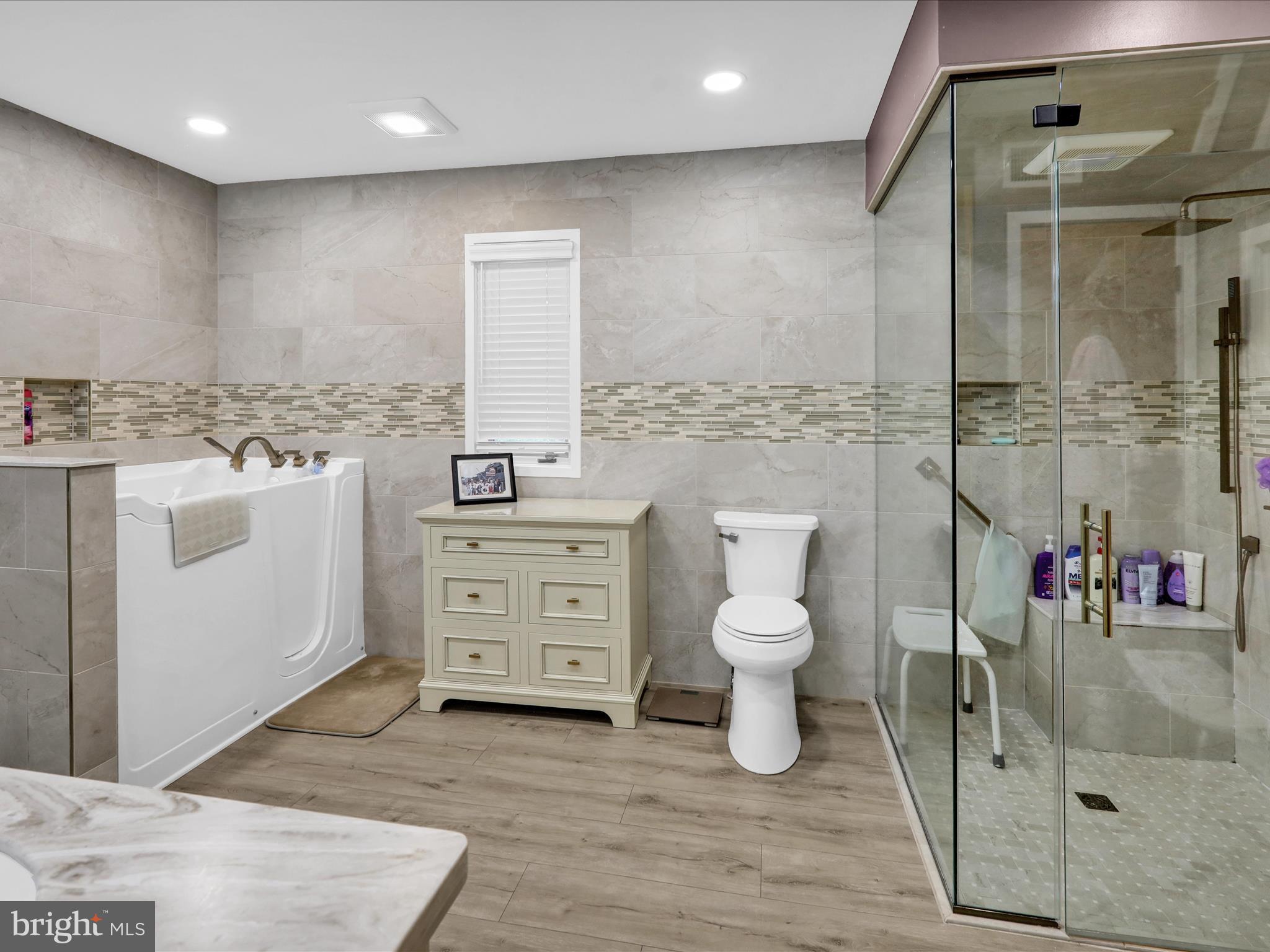 1617 Meadowlark Road Wyomissing, PA 19610 - Photo 39 of 99 a bathroom with a toilet a sink and mirror