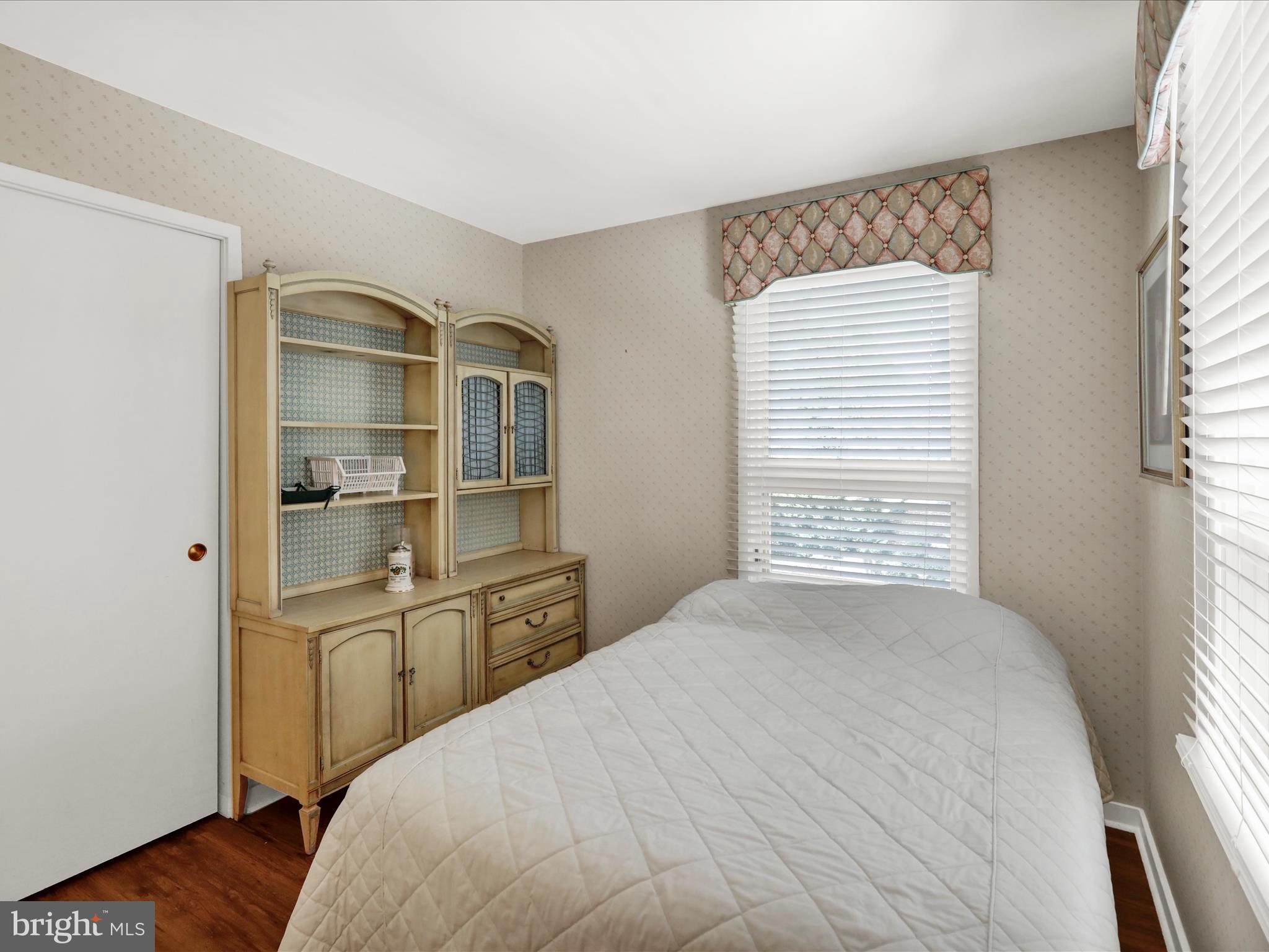 1617 Meadowlark Road Wyomissing, PA 19610 - Photo 46 of 99 a bedroom with a bed and a large window