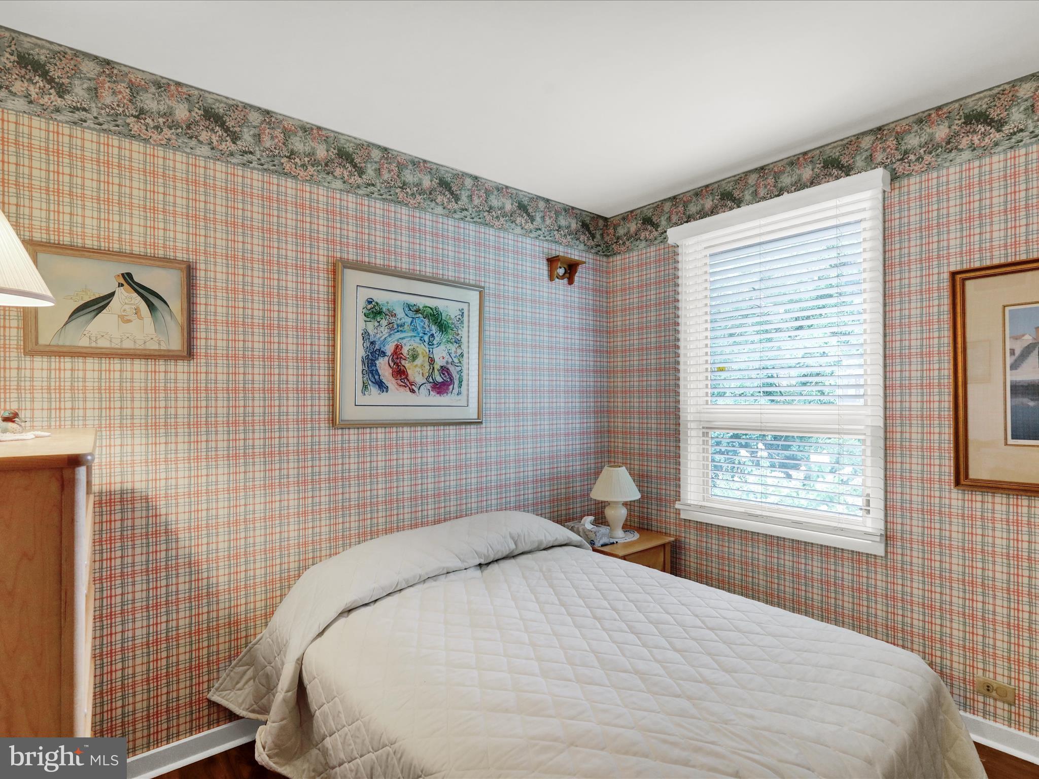 1617 Meadowlark Road Wyomissing, PA 19610 - Photo 47 of 99 a bedroom with a bed and a window