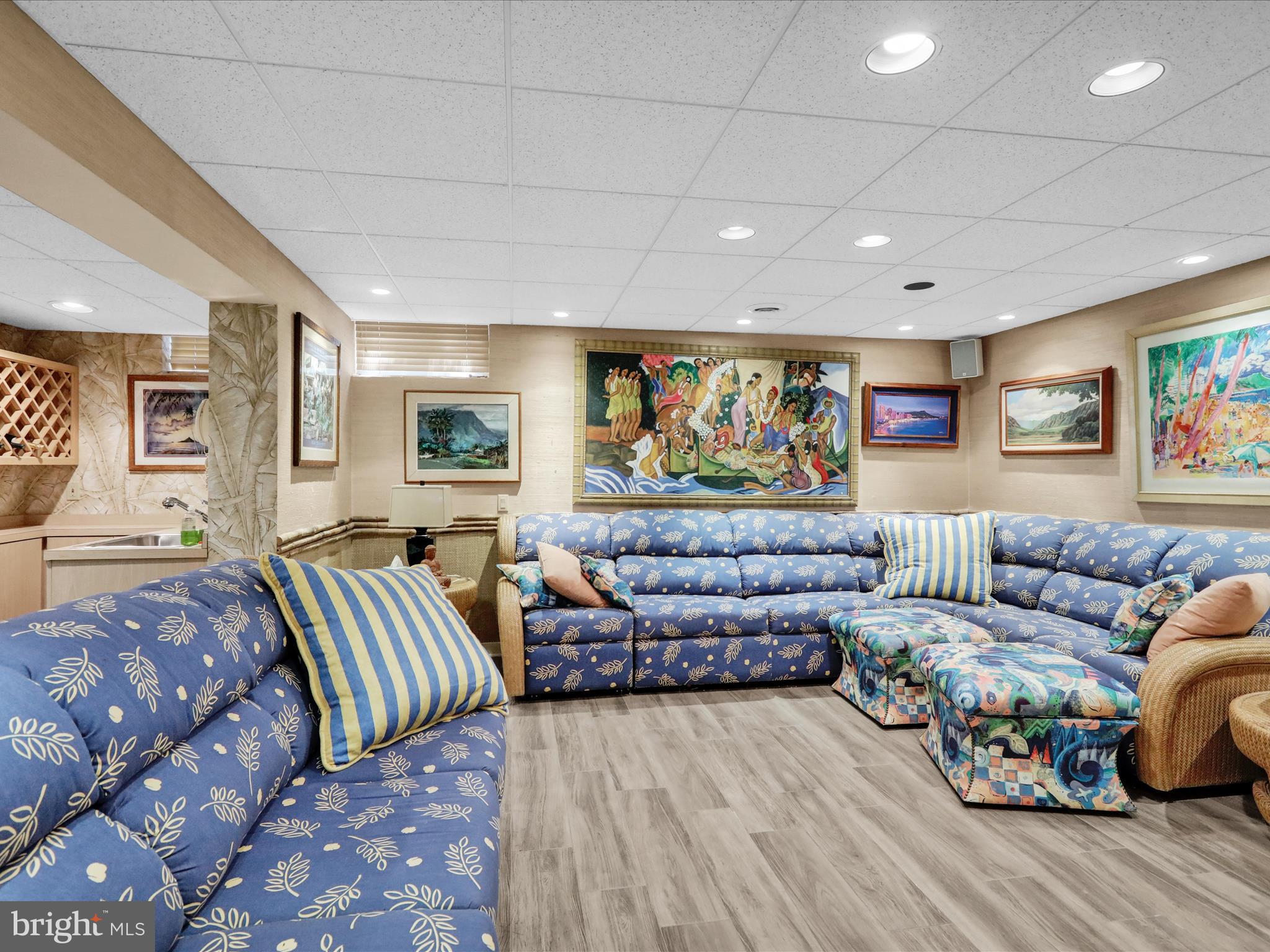 1617 Meadowlark Road Wyomissing, PA 19610 - Photo 52 of 99 a living room with furniture and a flat screen tv