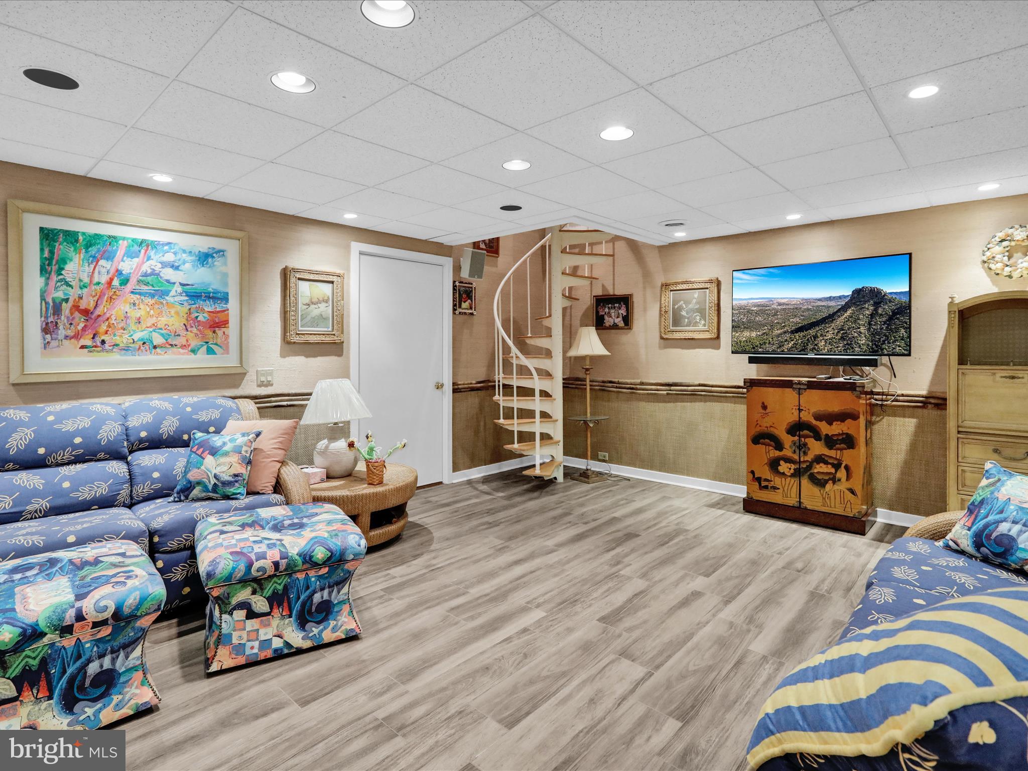 1617 Meadowlark Road Wyomissing, PA 19610 - Photo 53 of 99 a living room with furniture and a flat screen tv