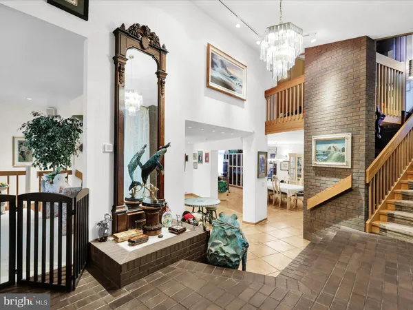 a living room with furniture and a painting