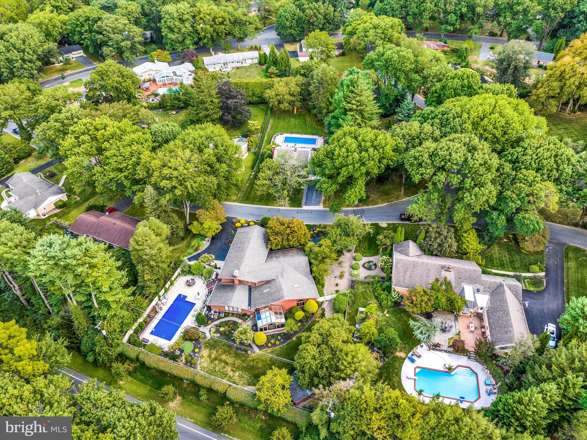 1617 Meadowlark Road Wyomissing, PA 19610 - Photo 83 of 99 an aerial view of a house with a yard and lake view