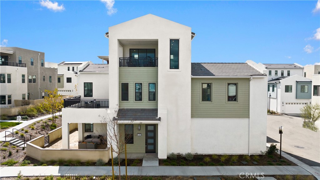 a front view of a house with entertaining space