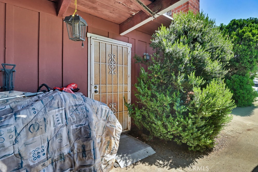 736 Sacramento Avenue Spring Valley, CA 91977 - Photo 3 of 33 a bed in a yard next to a building