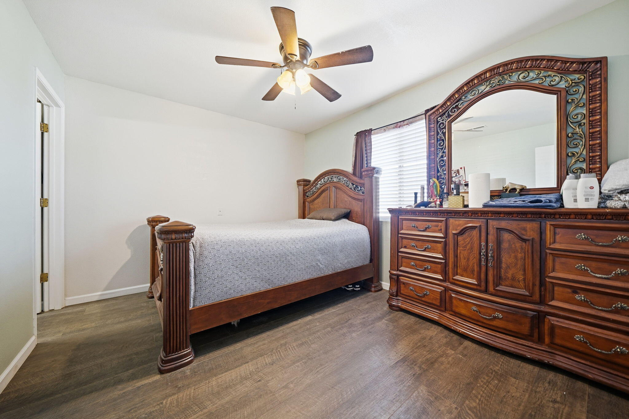 3661 Rabbit Lane Cottonwood, CA 96022 - Photo 12 of 38 a bedroom with a bed and a dresser