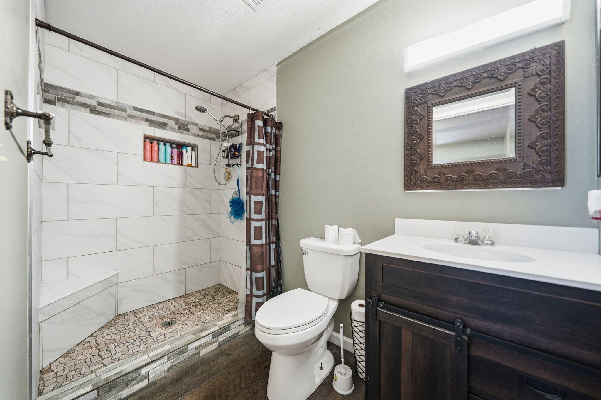 3661 Rabbit Lane Cottonwood, CA 96022 - Photo 13 of 38 a bathroom with a toilet sink and shower