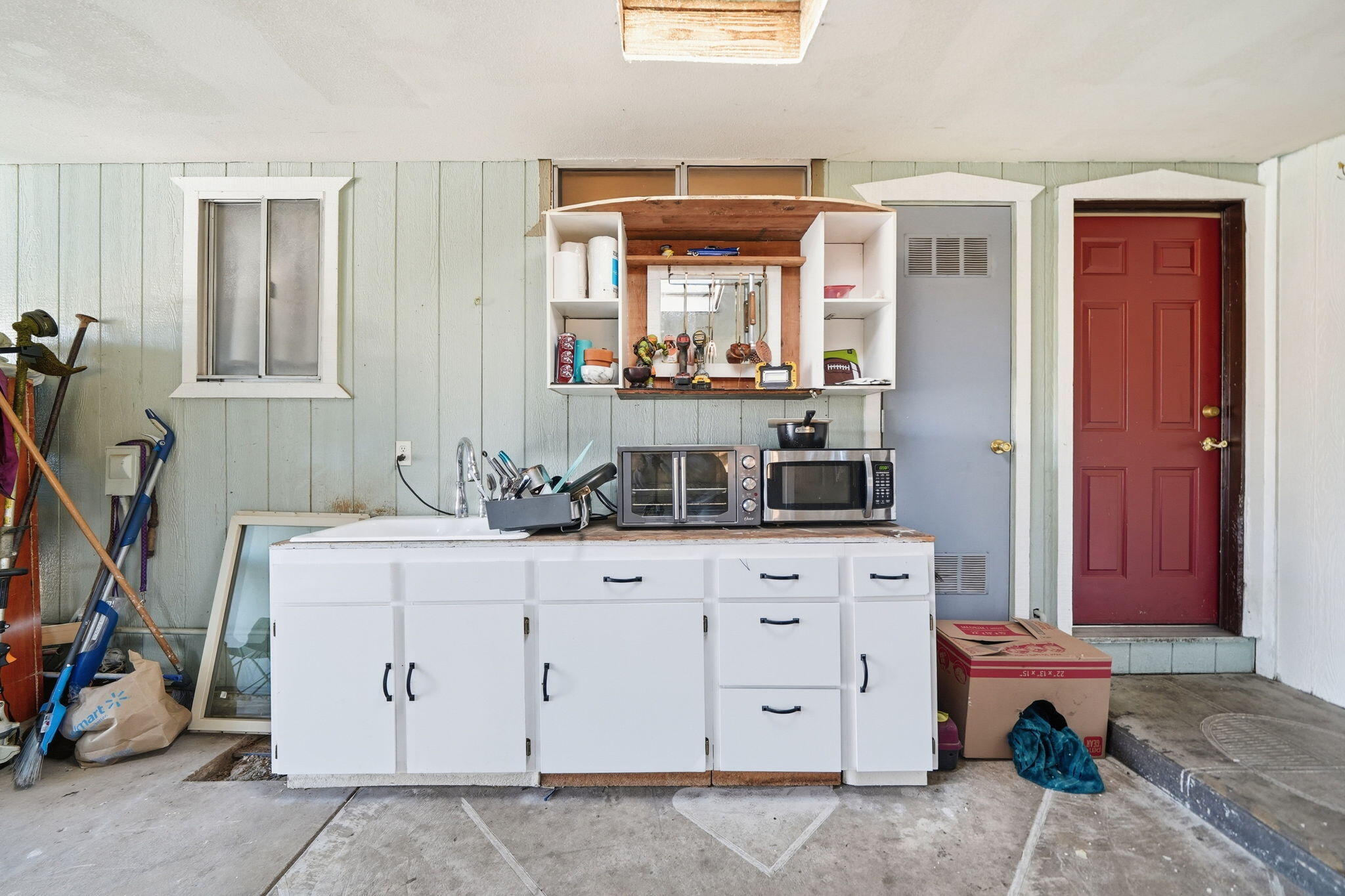 3661 Rabbit Lane Cottonwood, CA 96022 - Photo 20 of 38 a room with a mirror and cabinets