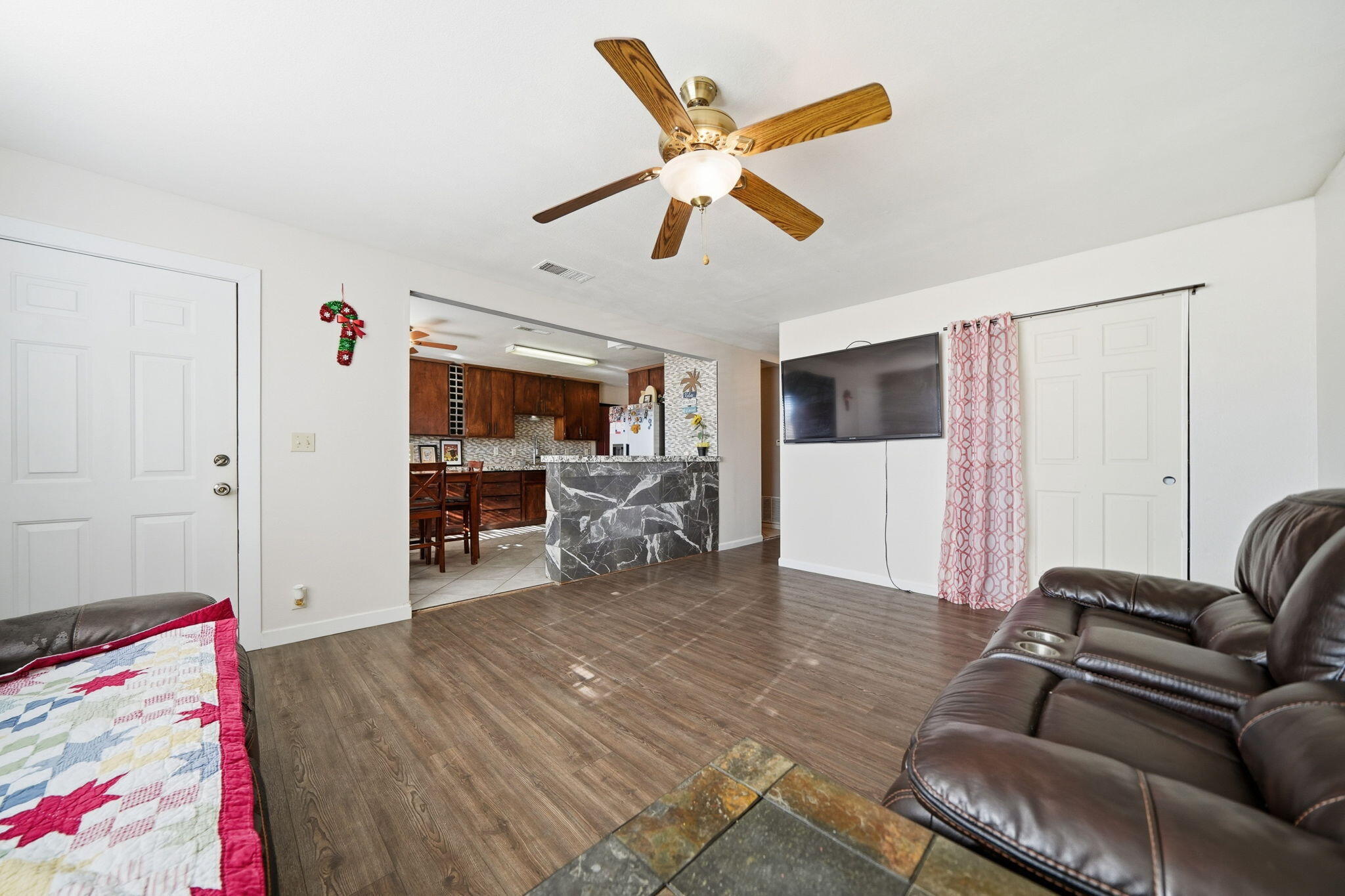 3661 Rabbit Lane Cottonwood, CA 96022 - Photo 4 of 38 a living room with furniture and a flat screen tv