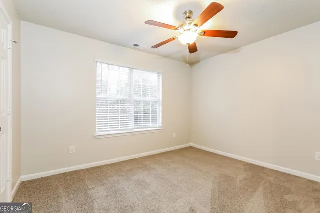 an empty room with a window