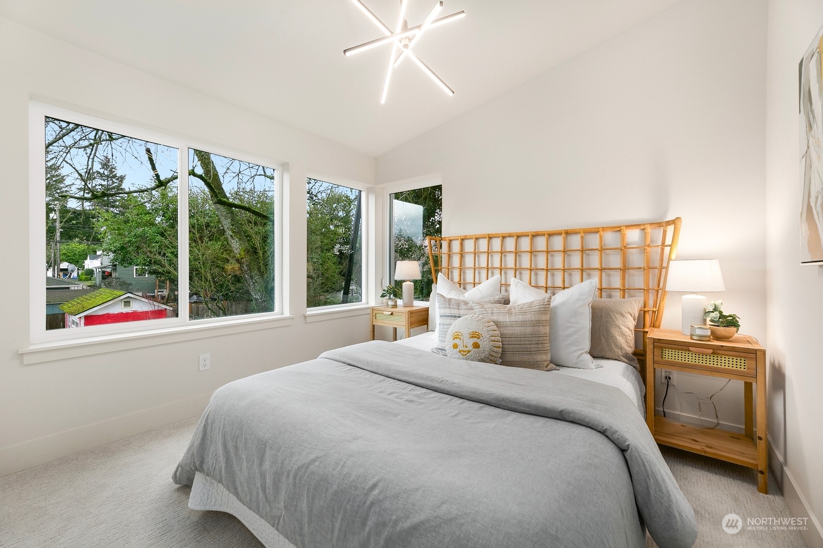 337 Northeast 90th Street, Unit 3 Seattle, WA 98115 - Photo 13 of 20 a bedroom with a bed and a window