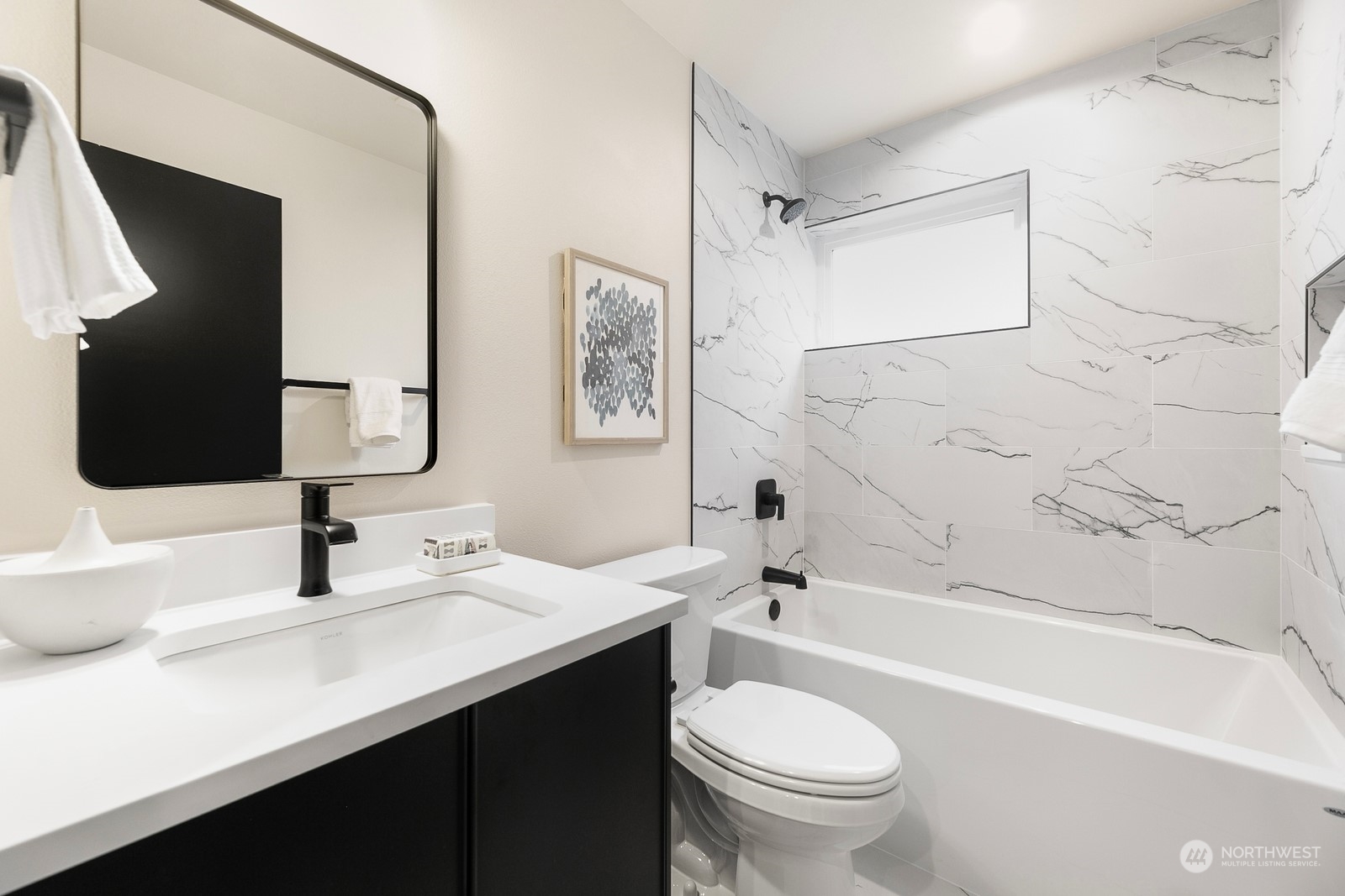 337 Northeast 90th Street, Unit 3 Seattle, WA 98115 - Photo 14 of 20 a bathroom with a sink a toilet and shower