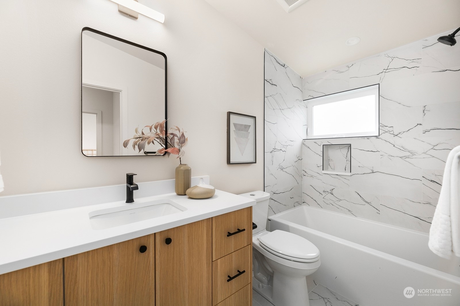 337 Northeast 90th Street, Unit 3 Seattle, WA 98115 - Photo 15 of 20 a bathroom with a sink a toilet and shower