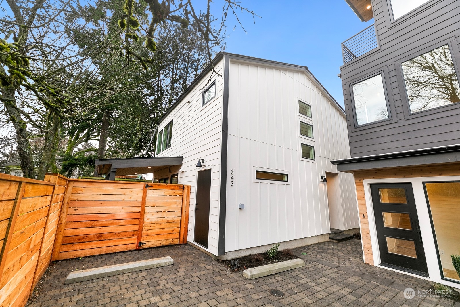 337 Northeast 90th Street, Unit 3 Seattle, WA 98115 - Photo 3 of 20 a view of a two chairs in the balcony
