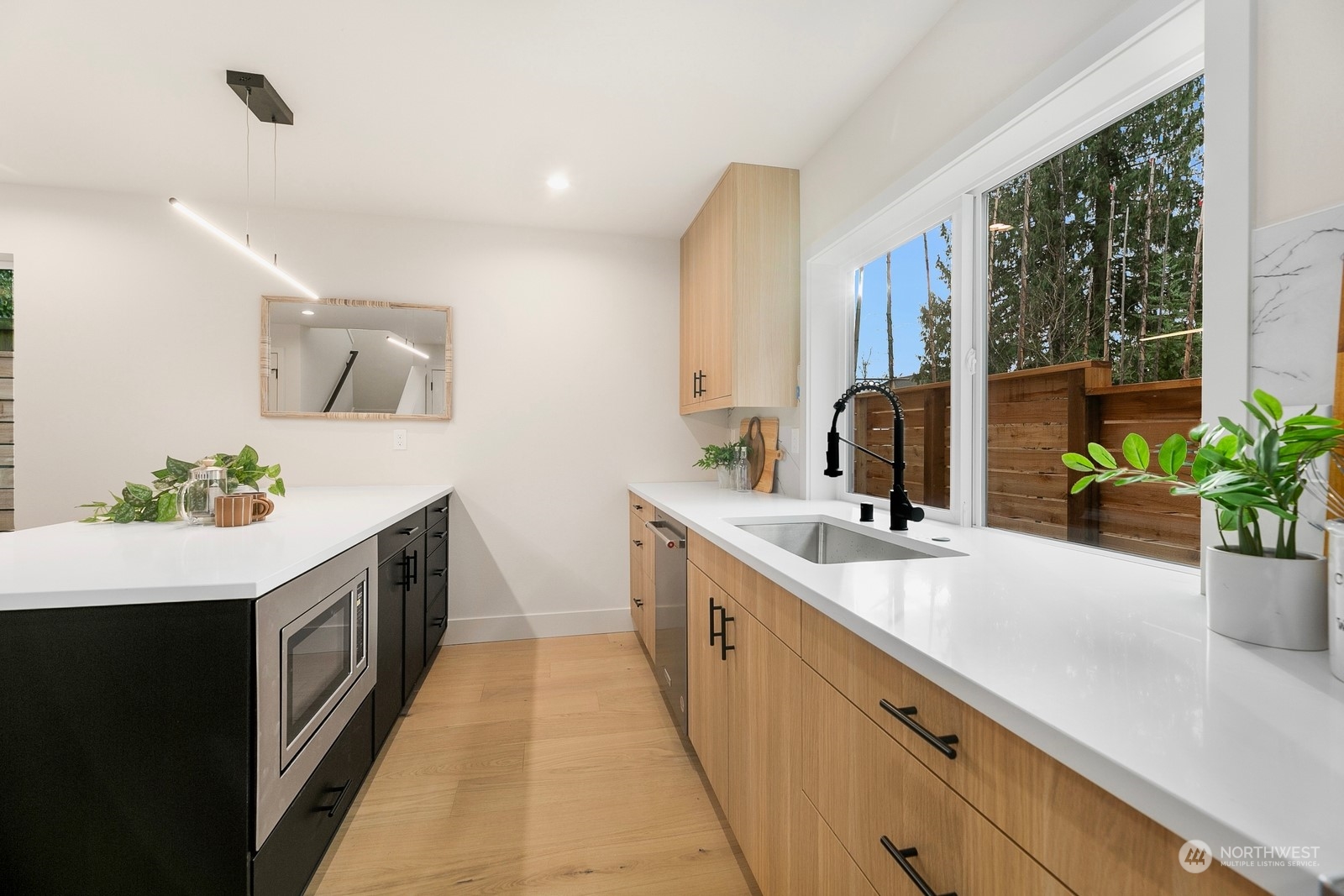 337 Northeast 90th Street, Unit 3 Seattle, WA 98115 - Photo 9 of 20 a kitchen with sink and stove