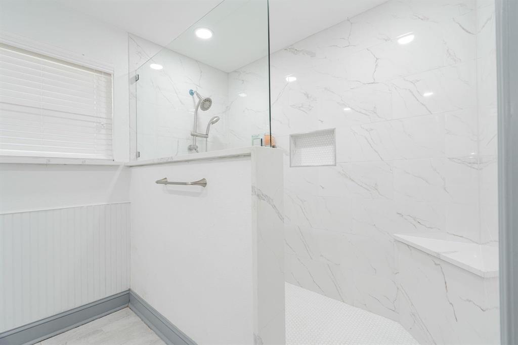 9884 Cherokee Trail Quinlan, TX 75474 - Photo 27 of 36 a bathroom with a shower