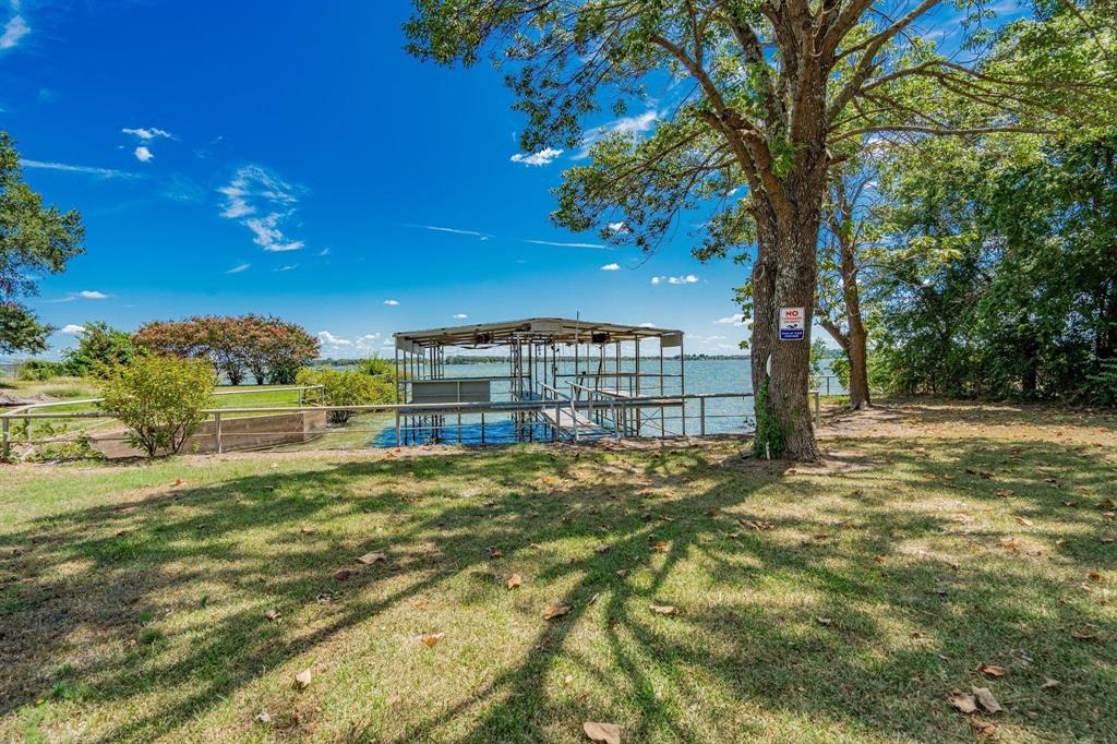 9884 Cherokee Trail Quinlan, TX 75474 - Photo 5 of 36 a view of an outdoor space and basketball court