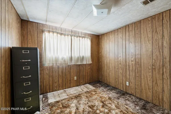 a bathroom with a sink a toilet and shower curtain