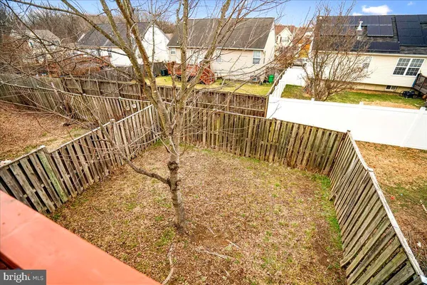 a view of balcony with wooden floor