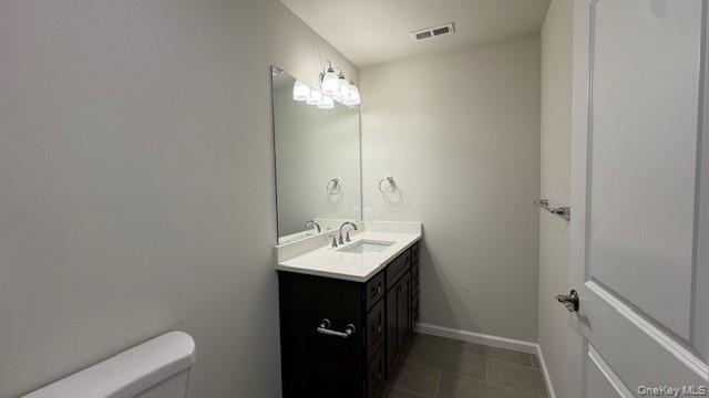 135 Cooper Road, Unit 3 Fishkill, NY 12524 - Photo 15 of 22 Main Full Bathroom featuring tile patterned floors, vanity, and toilet